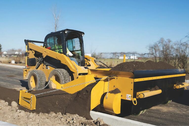 New Road Widener Curb Backfiller attachment for FH-R Material Placement