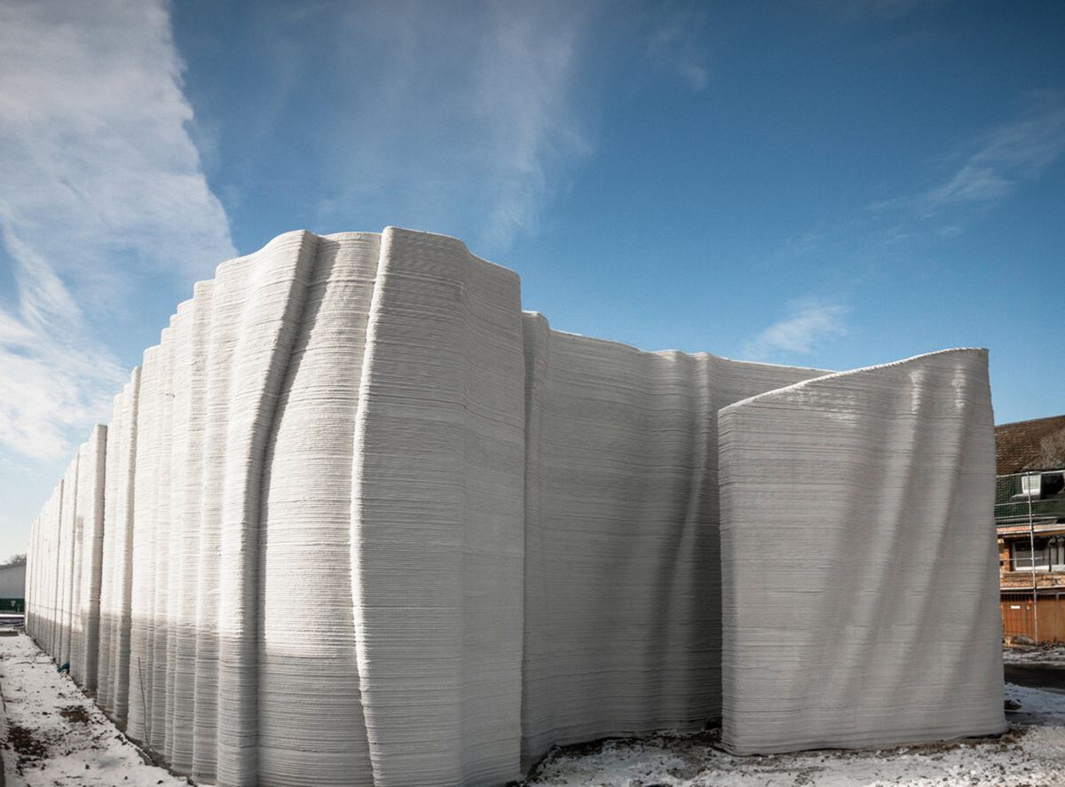 Wavy wall façade of Europe’s largest 3D printed building, which would have been close to impossible to make with conventional construction methods.
