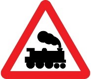 railway crossing with no marked barrier or gate 