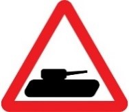 slow-moving military vehicles crossing or driving on the road