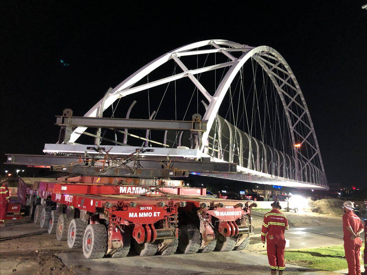 Unique S Curved Pedestrian Bridge installed over Texas highway by Mammoet