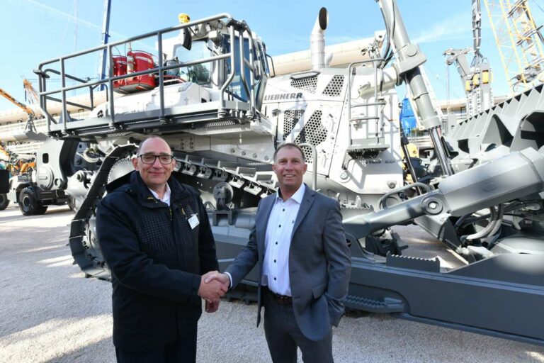 Alexander Katrycz, Head of Marketing at Liebherr-Werk Telfs GmbH (left) and Scott Crozier, Vice President, Civil Construction Field Systems at Trimble (right) at bauma 2025 event.