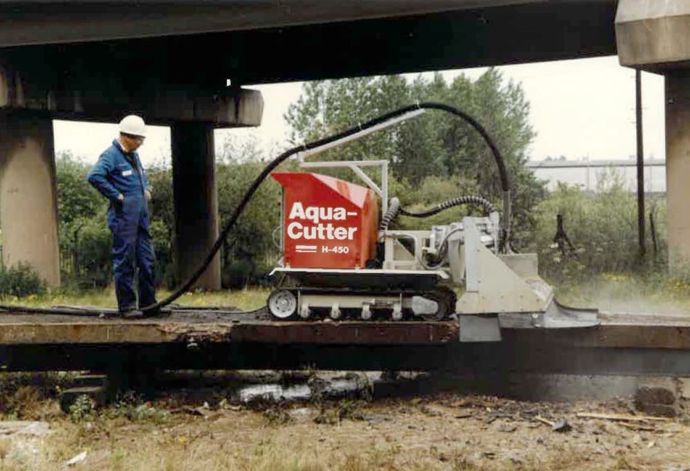 Hydrodemolition is an impact-free technique that uses a high-pressure water jet to remove concrete.