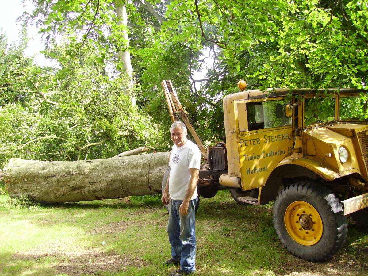 Founder Peter Stevens in the mid-2000s in front of a modified gun tractor dating back to WWII.